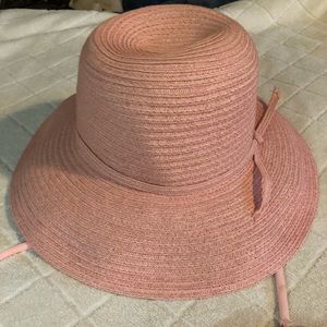 Pale peachy pink straw hat